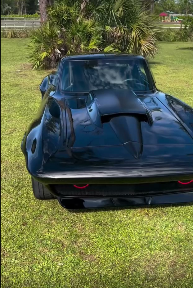 Structural auto body restoration work being performed on a Chevrolet Corvette.