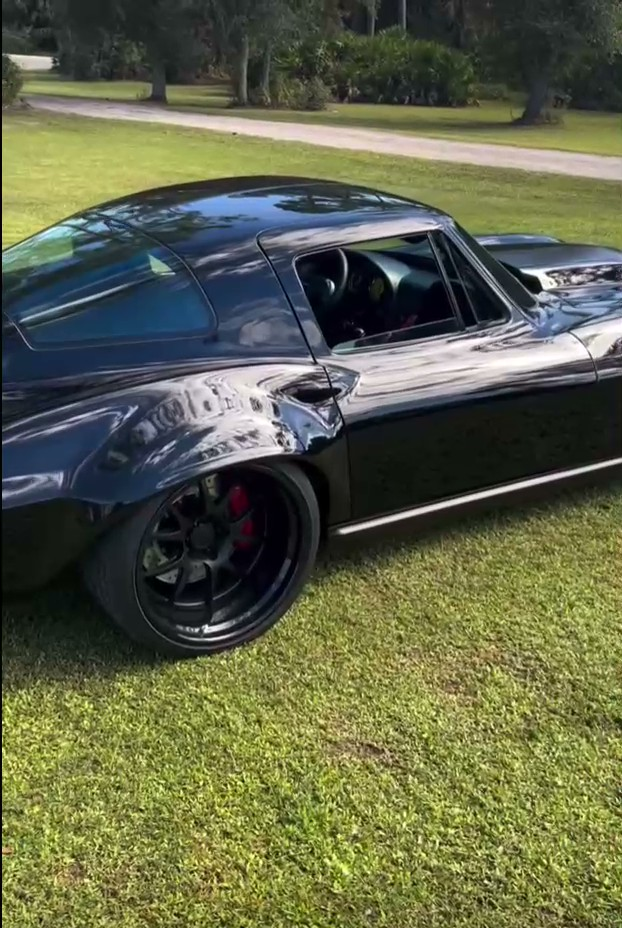 Finished paint and body work on a Chevrolet Corvette front passenger side.